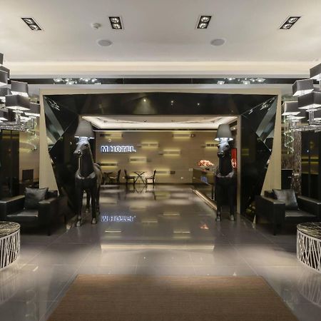 M Hotel كاوتون المظهر الخارجي الصورة